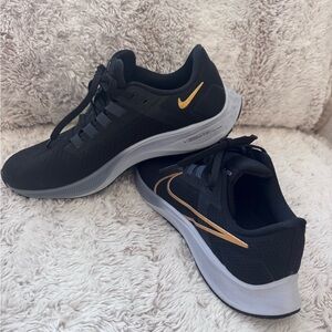Nike Pegasus 38 black and gold running shoe